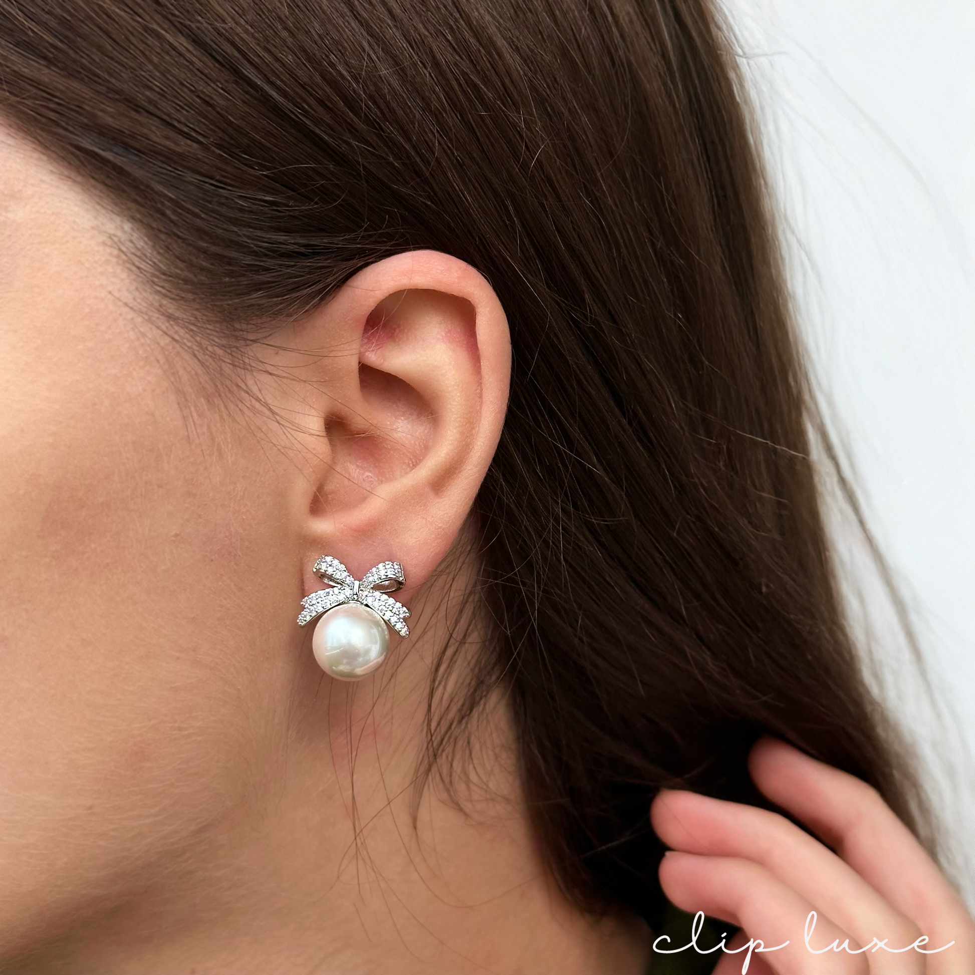 Luxe silver bow pearl clip on earrings
