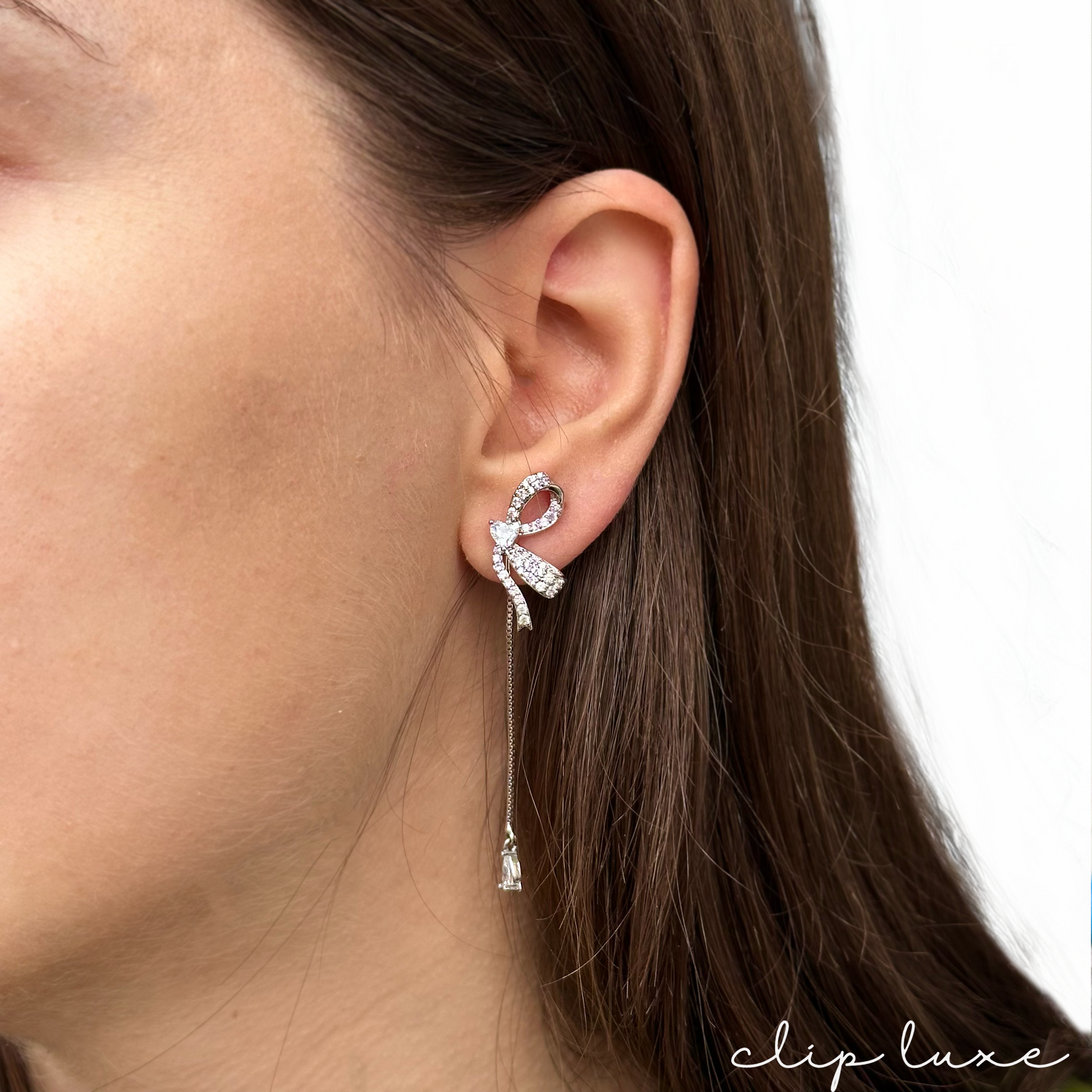 Petite silver half bow clip on earrings