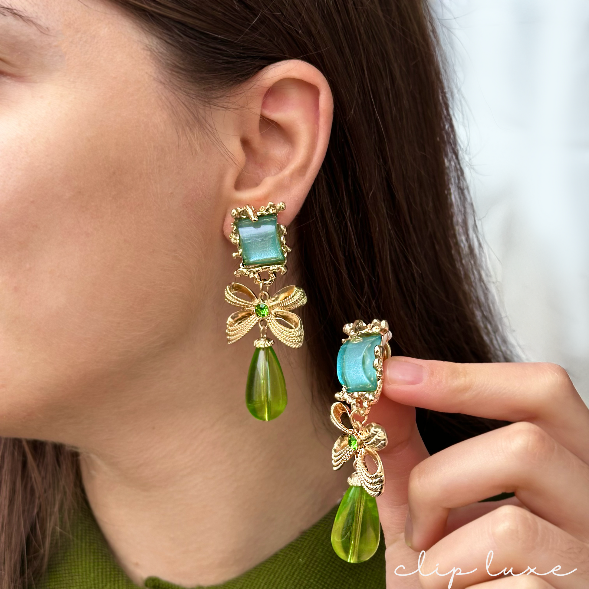 Statement gold and emerald drop clip on earrings