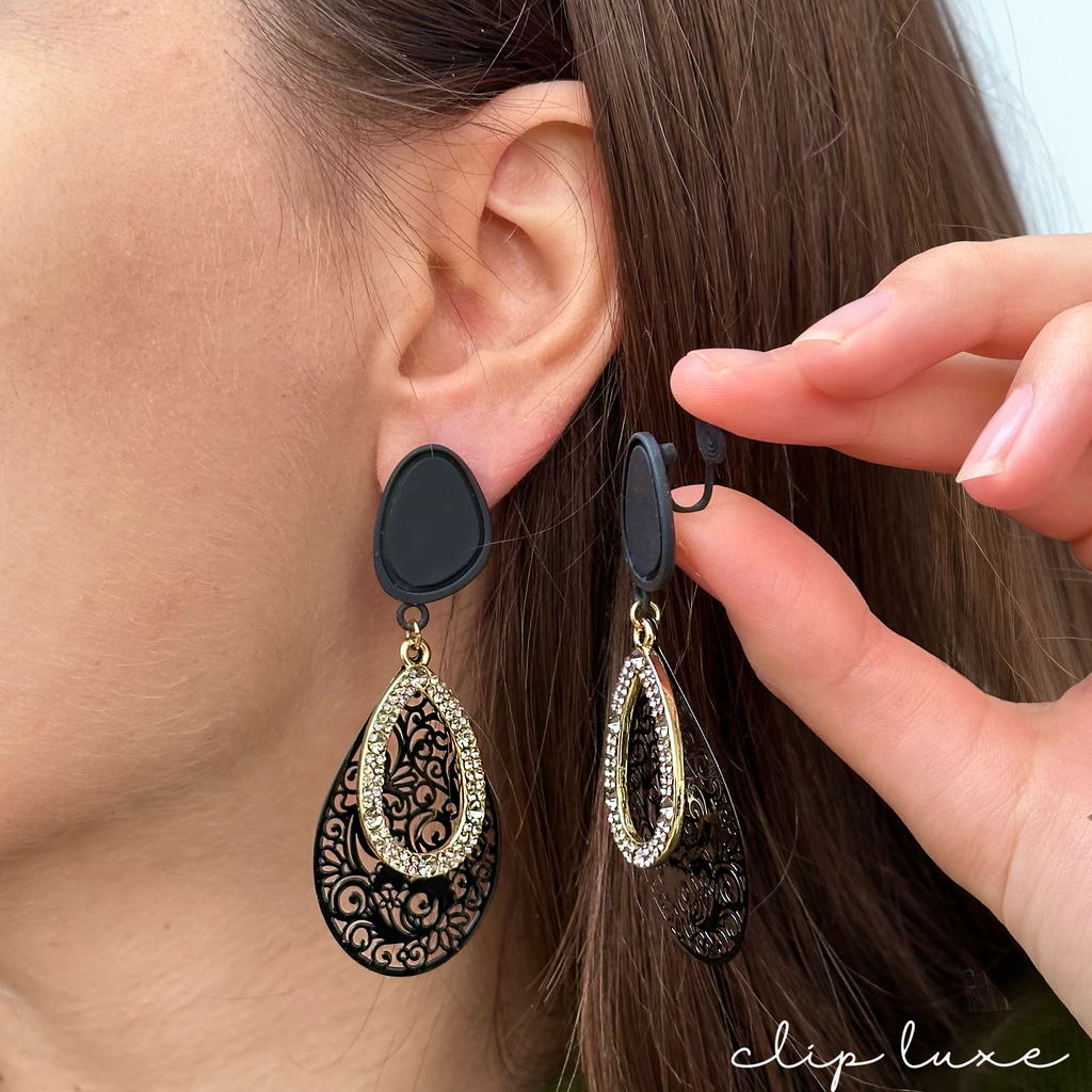 Sleek matte gold drop clip on earrings