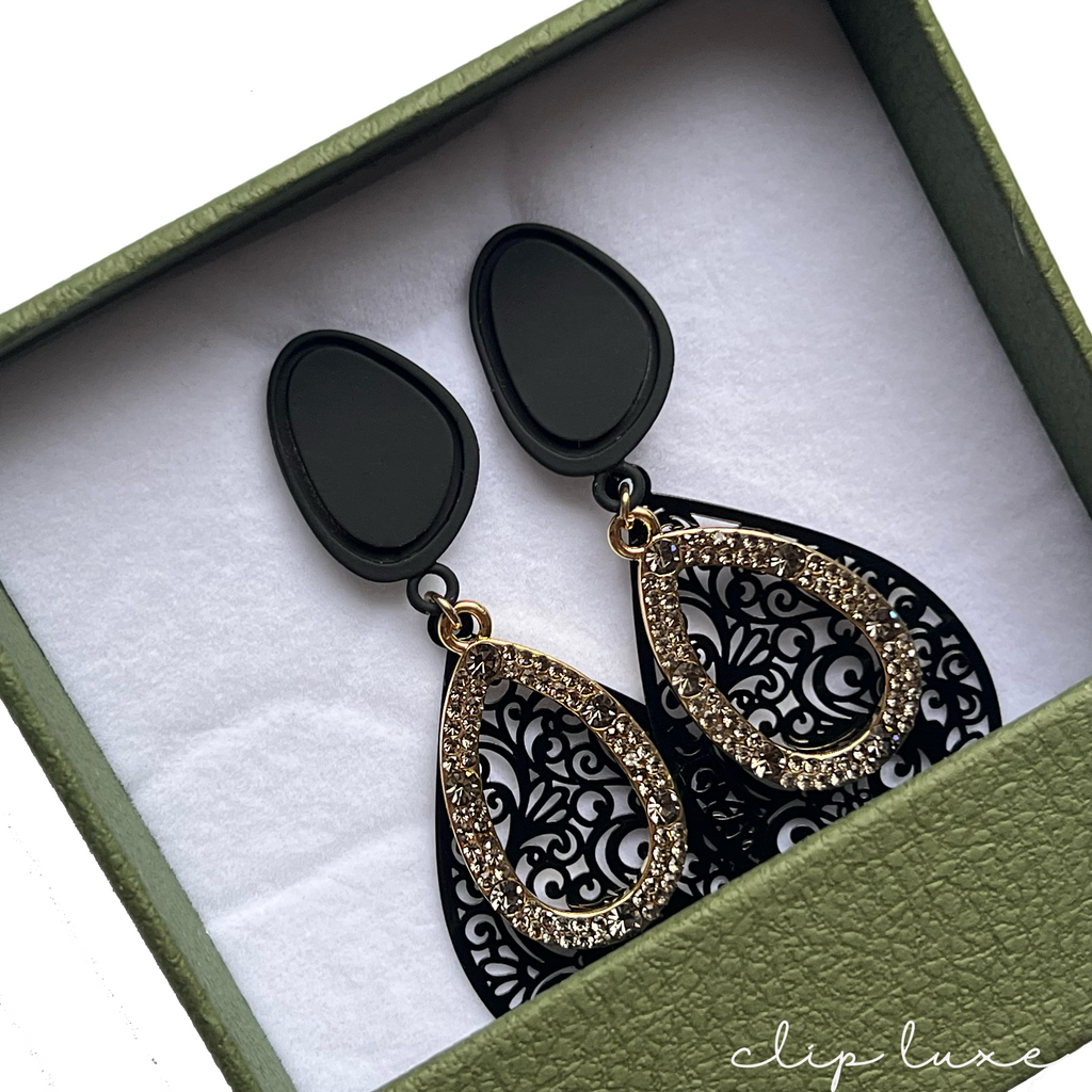 Sleek matte gold drop clip on earrings