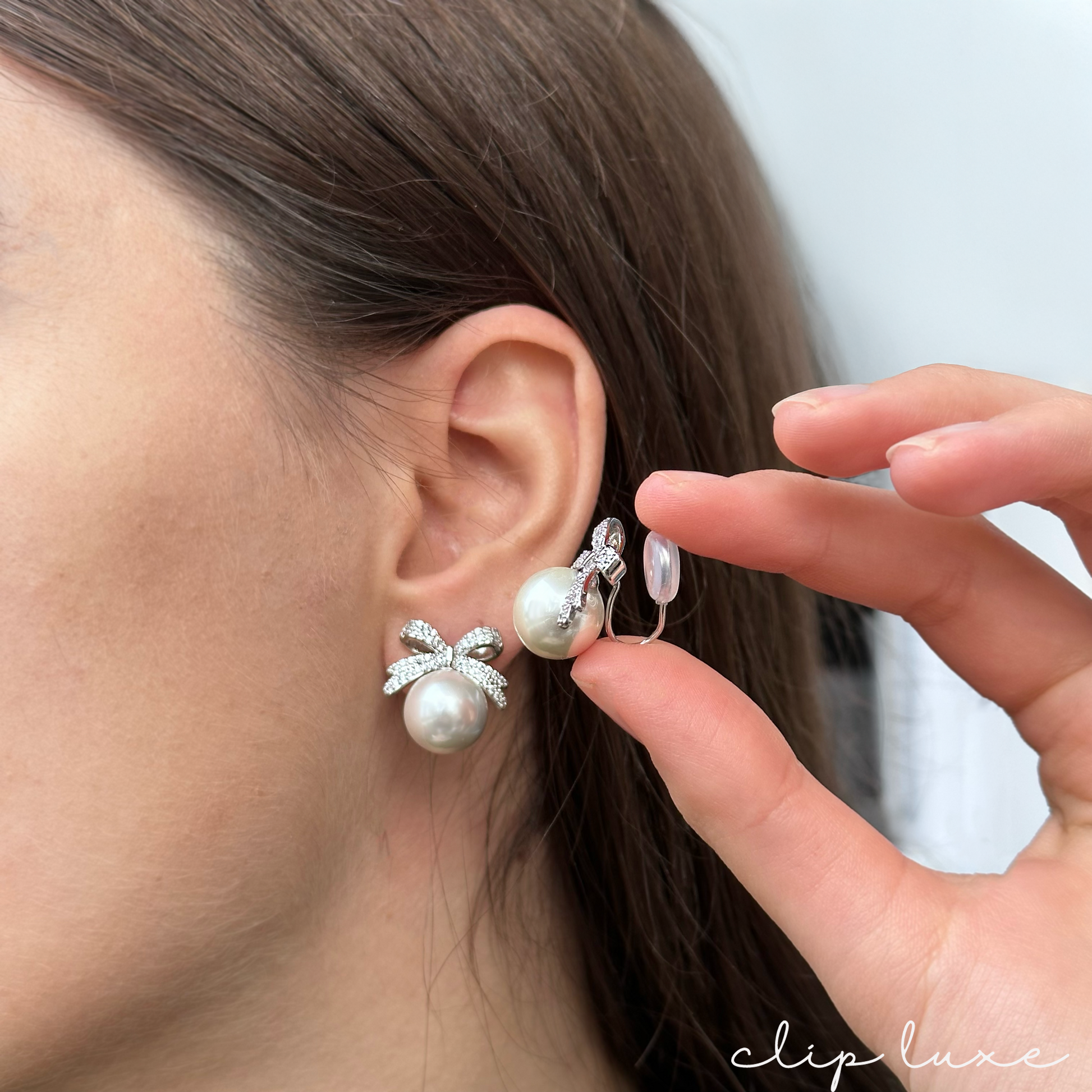 Luxe silver bow pearl clip on earrings