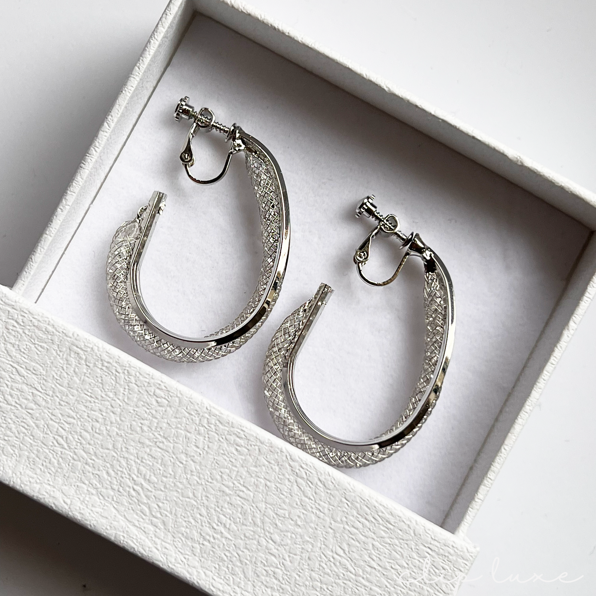 Glitter silver hoop clip on earrings