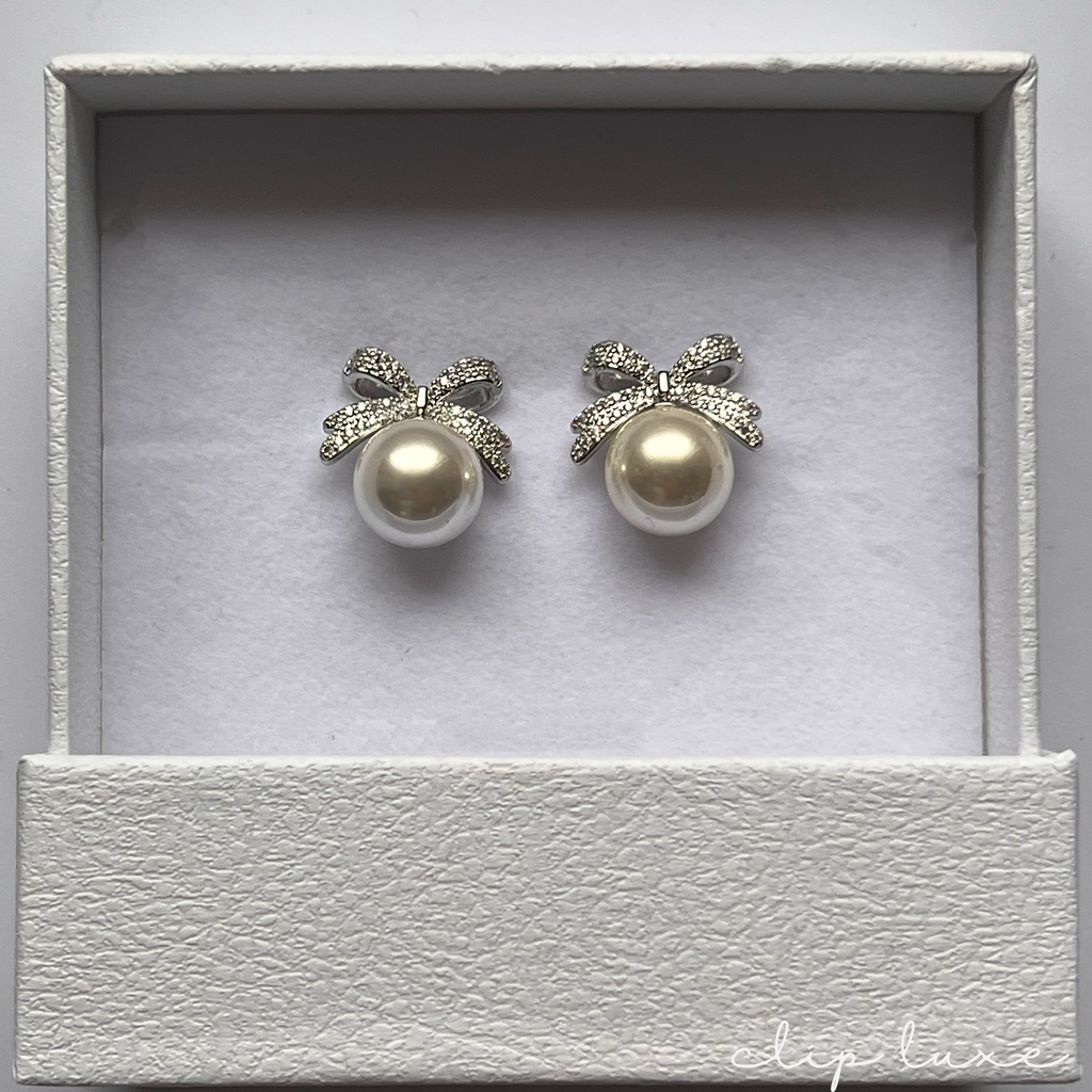 Luxe silver bow pearl clip on earrings