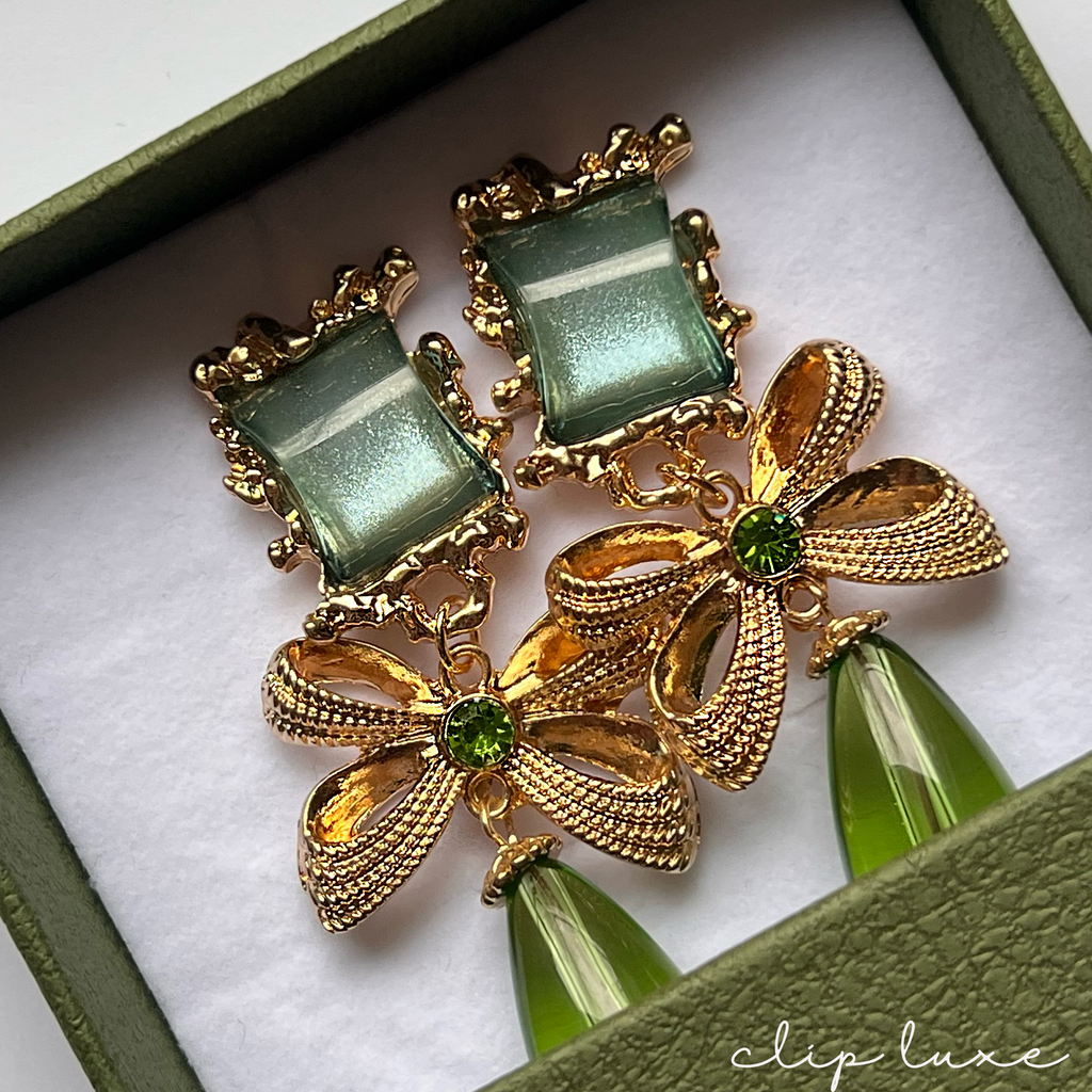 Statement gold and emerald drop clip on earrings