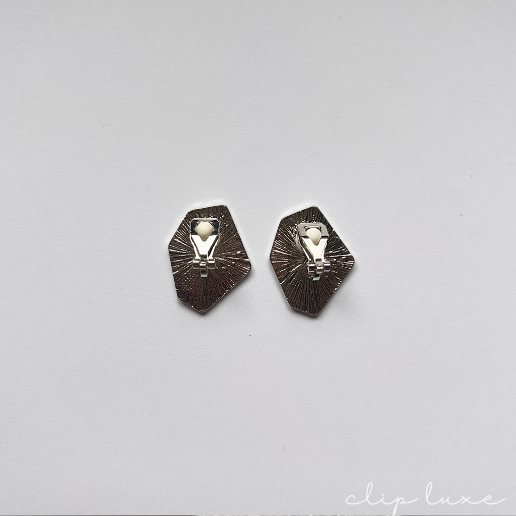 Edgy stainless steel stud clip on earrings