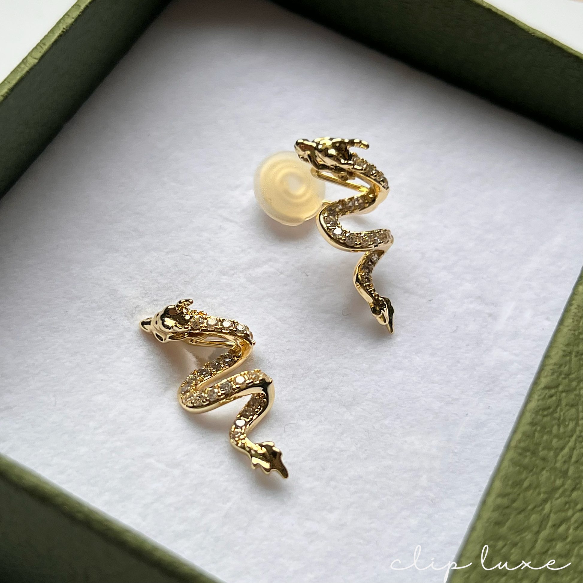 Studded gold dragon clip on earrings