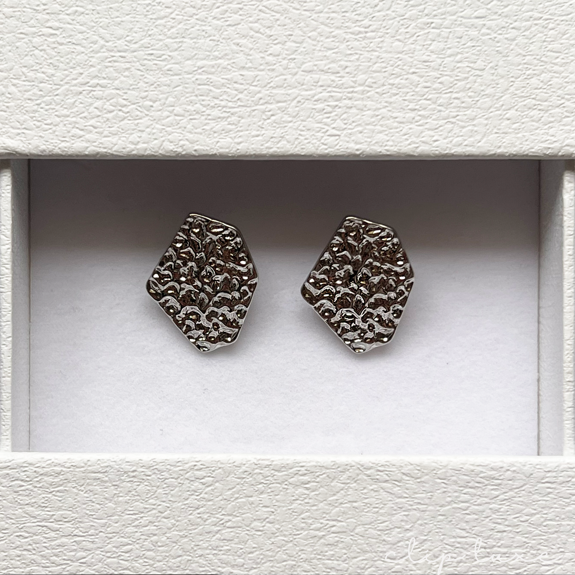Edgy stainless steel stud clip on earrings