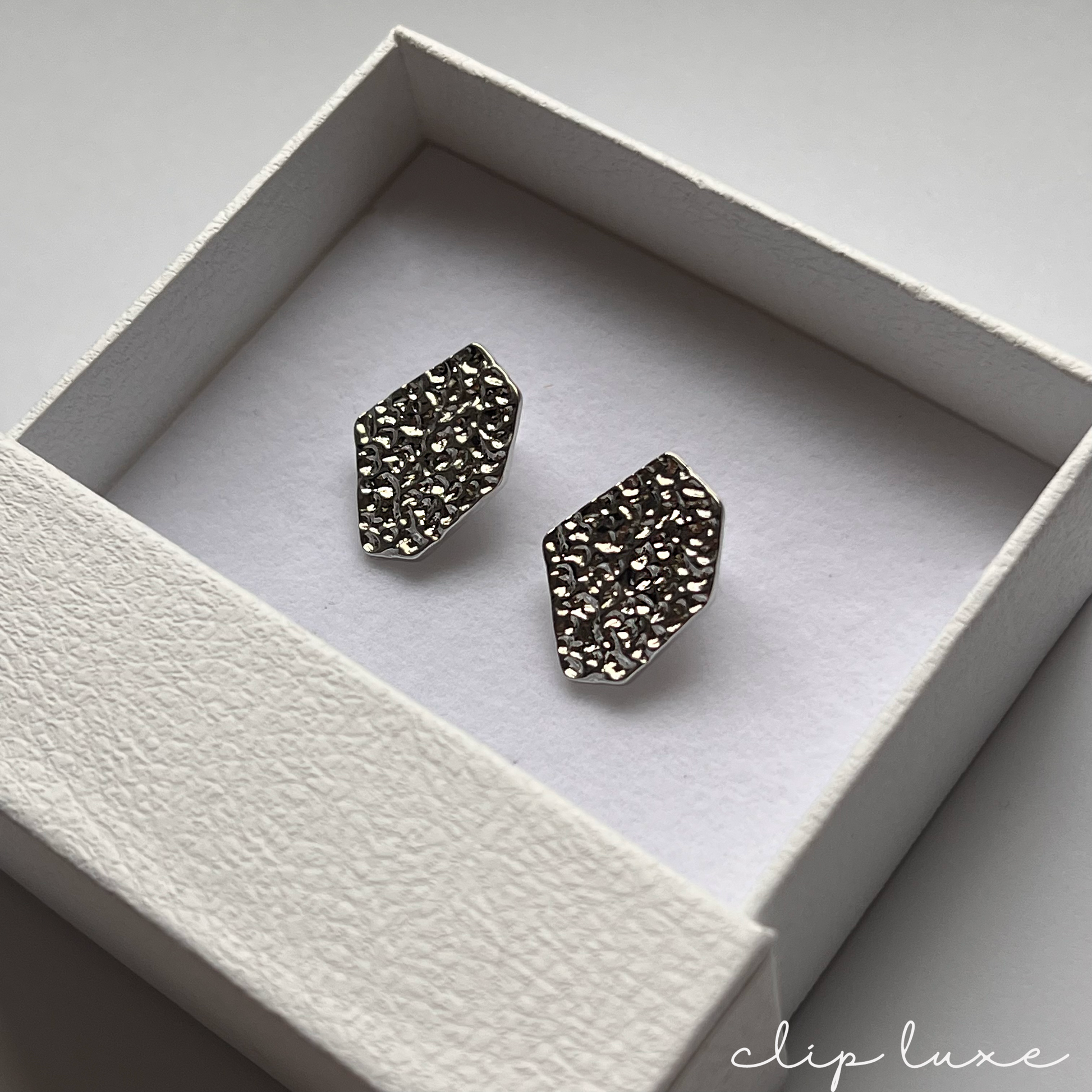 Edgy stainless steel stud clip on earrings