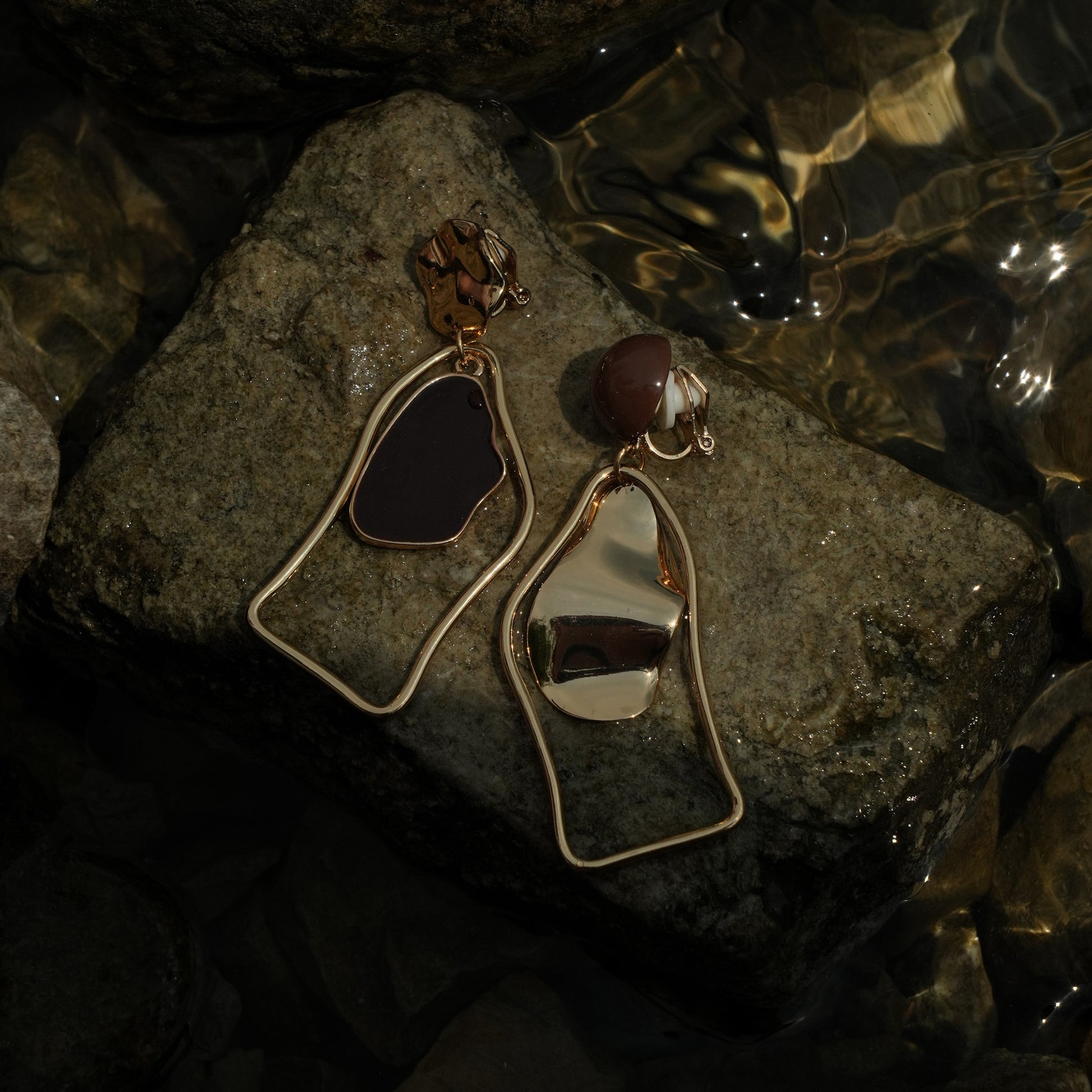 Contemporary brown black and gold clip on earrings