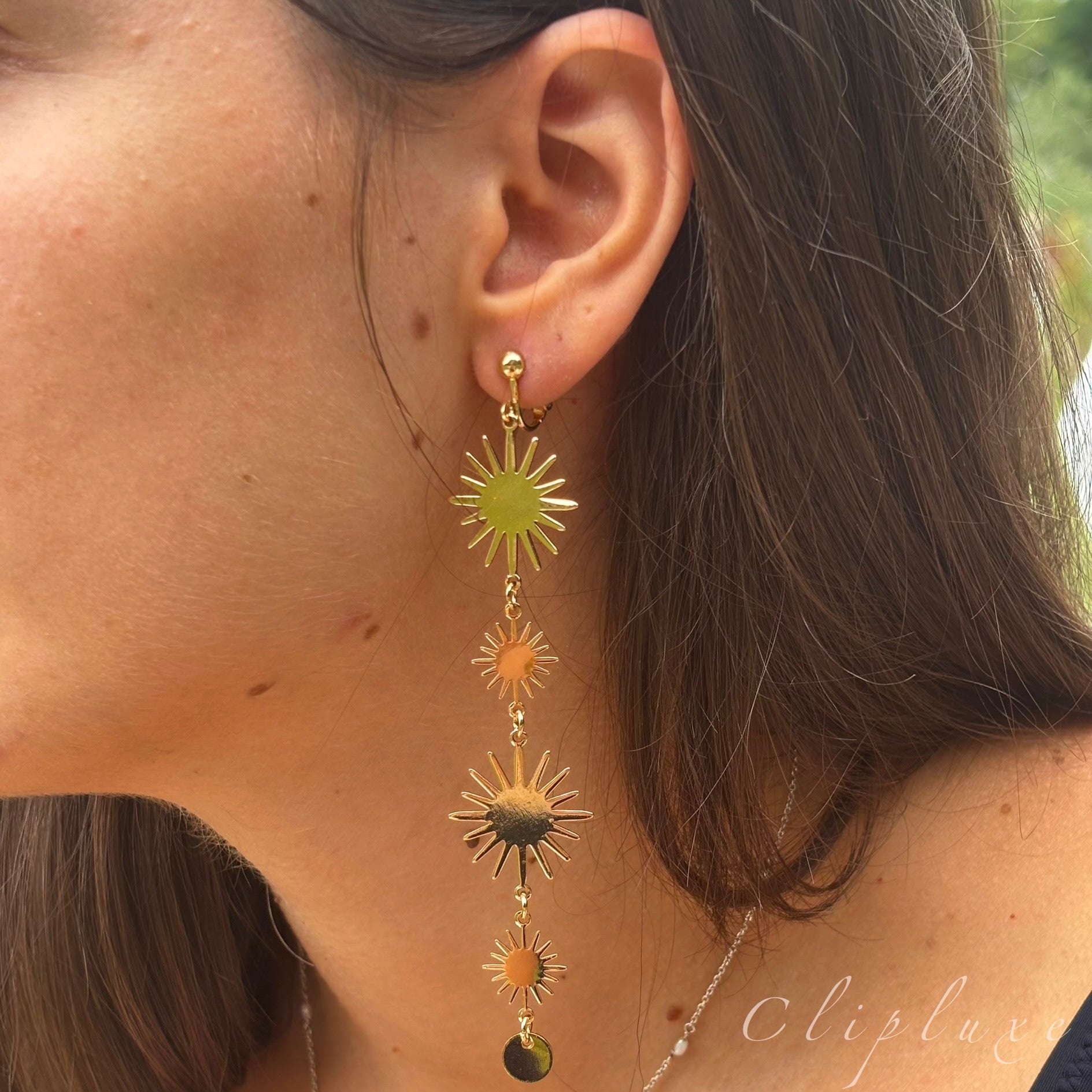 Golden sun hanging clip on earrings