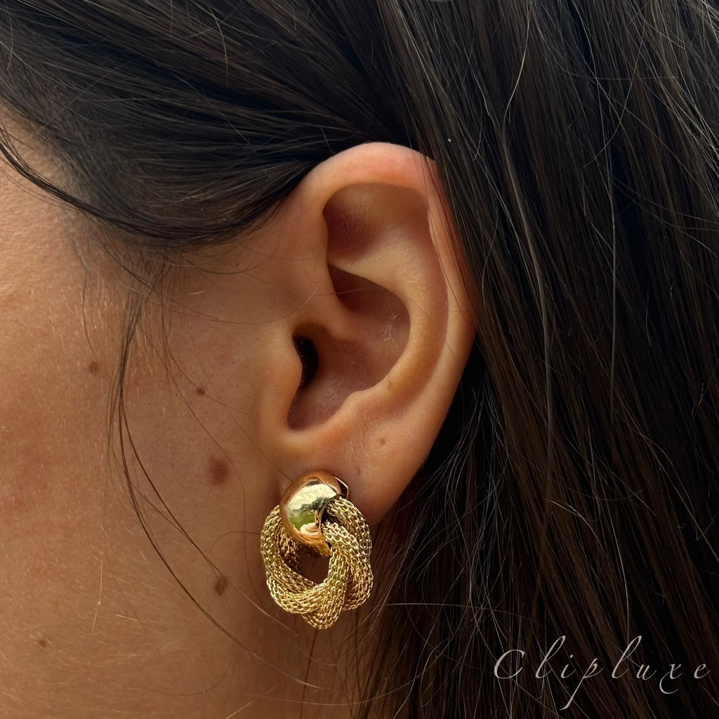 Twisted gold clip on earrings