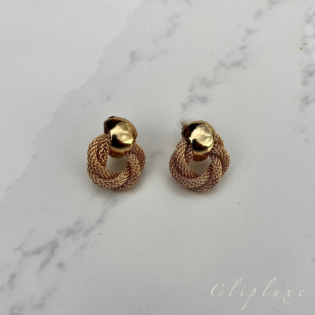 Twisted gold clip on earrings