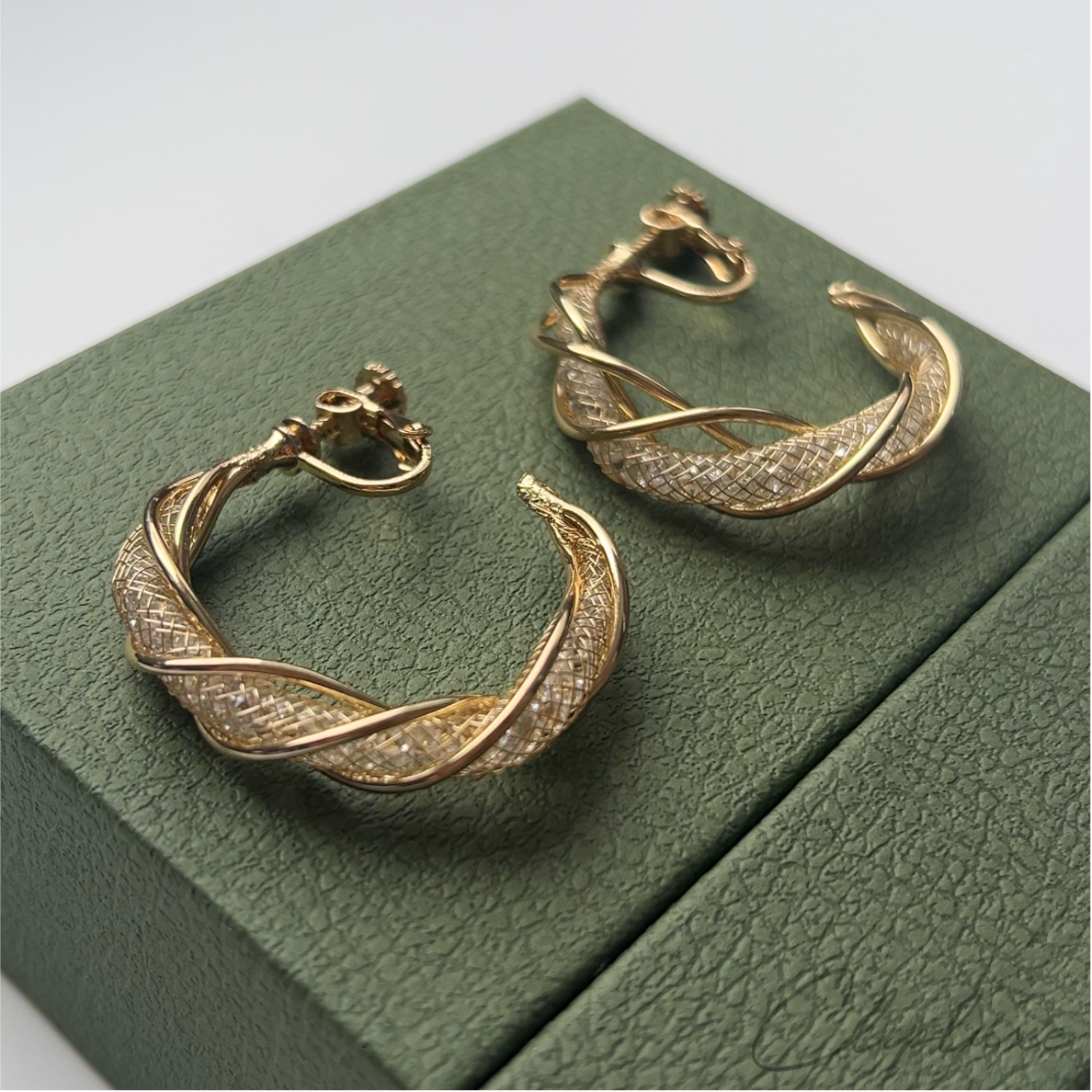Twisted glitter hoops Clip-on earring