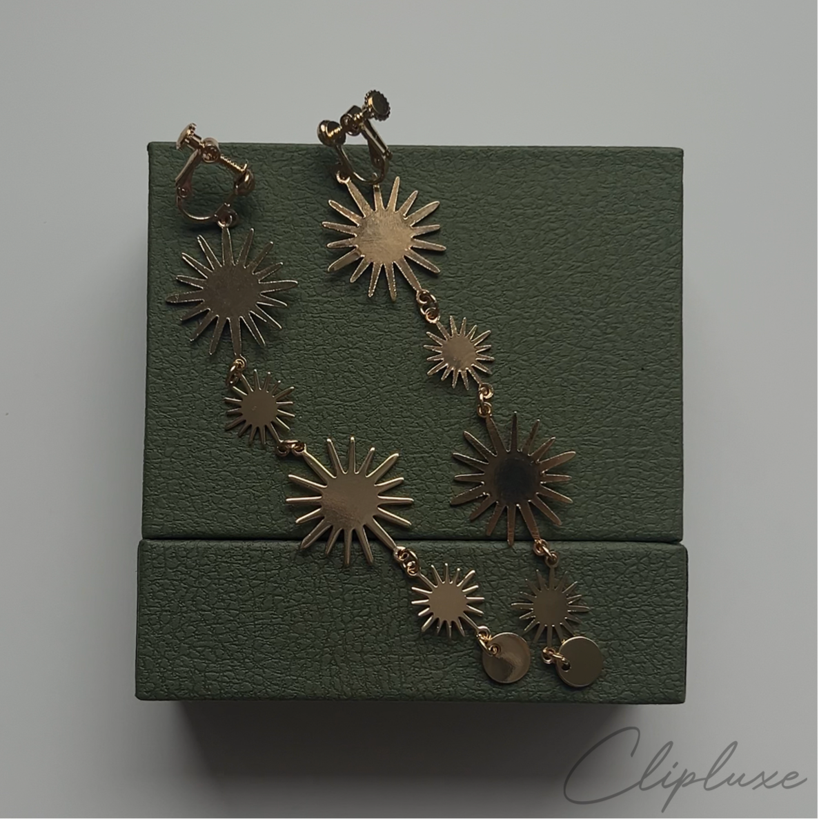 Hanging suns Clip-on earring