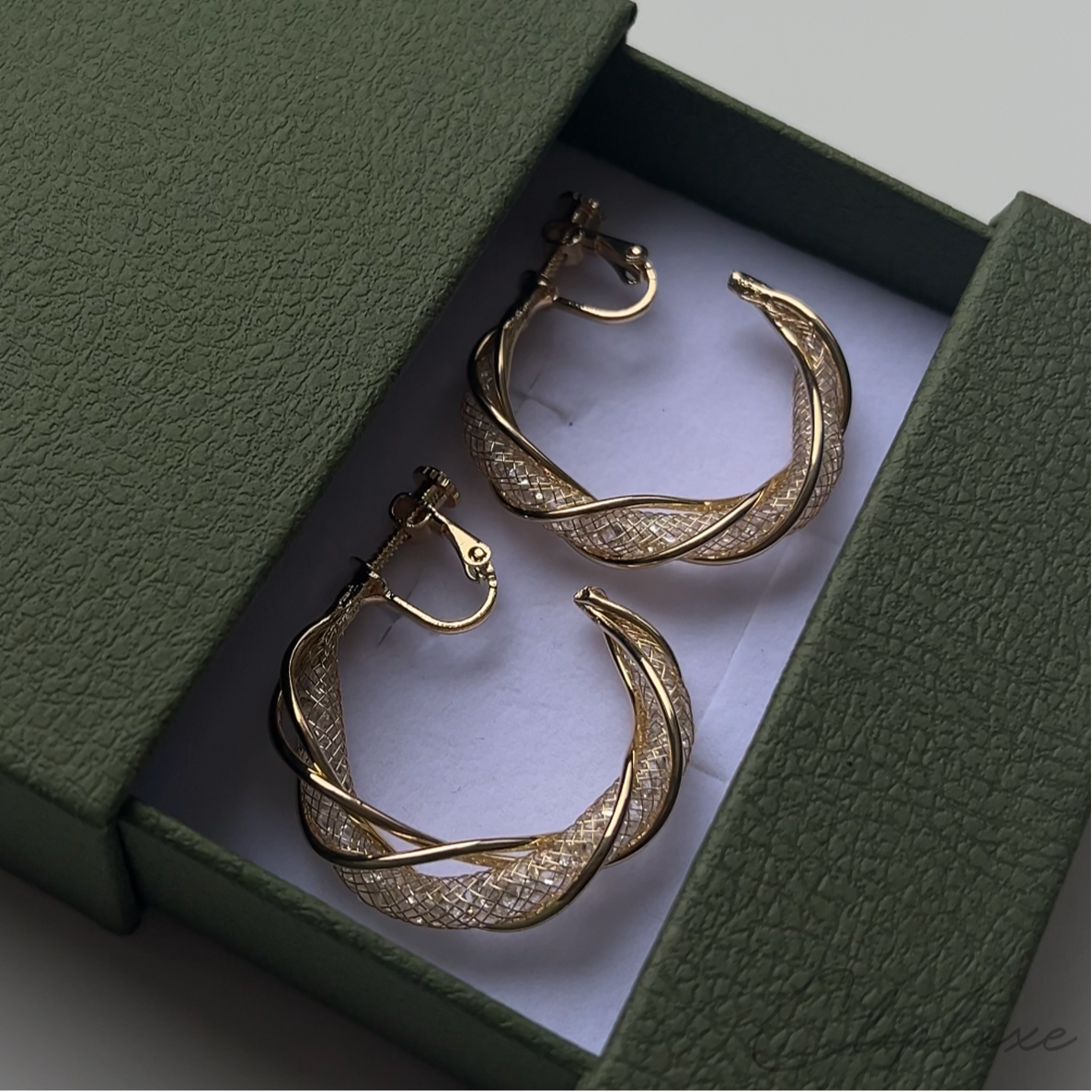 Twisted glitter hoops Clip-on earring