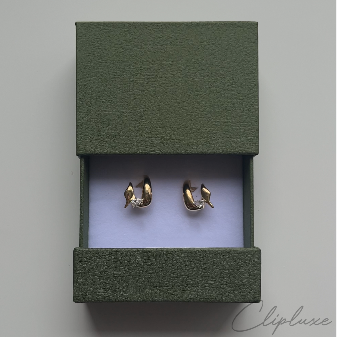 Twisted hoops with gem Clip-on earring