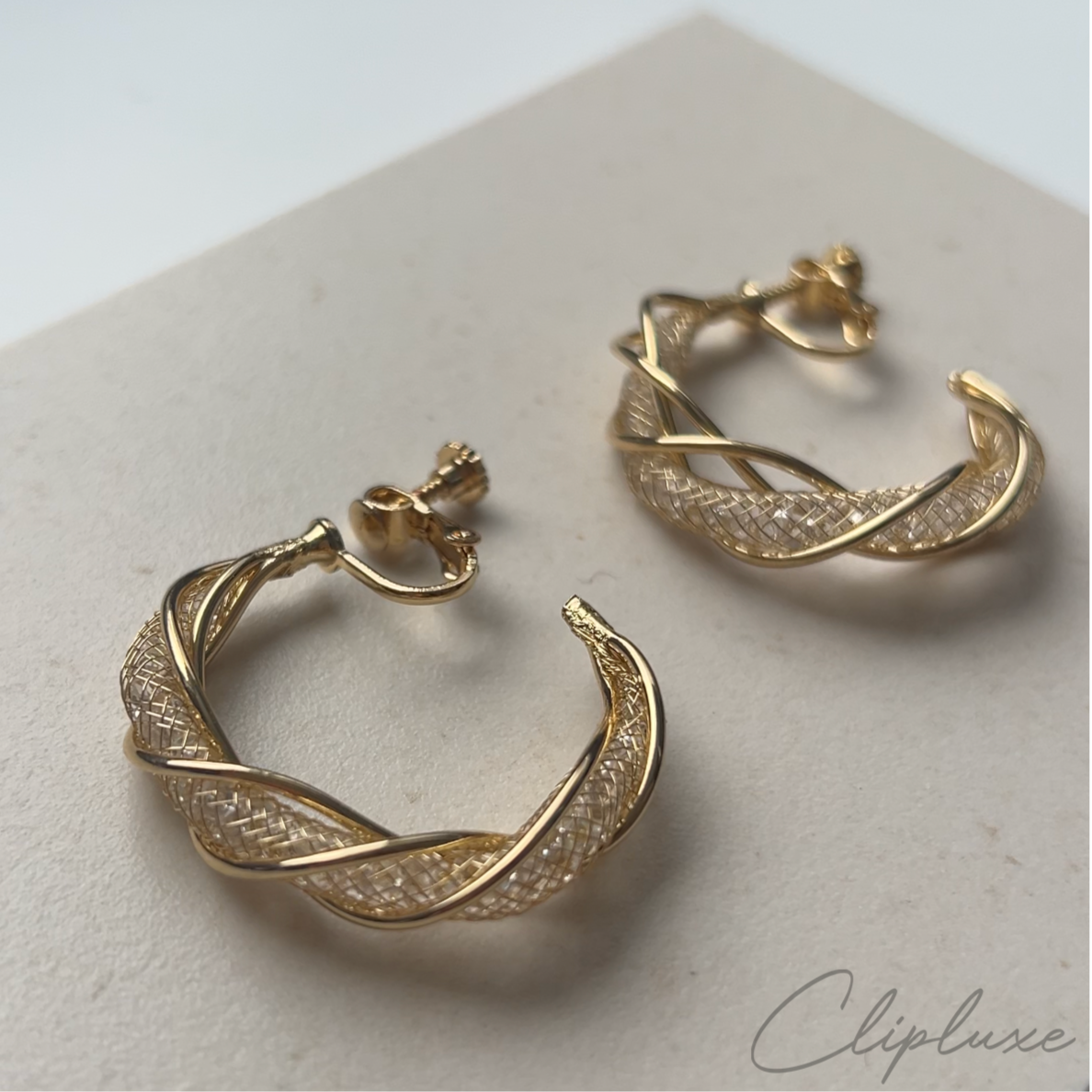 Twisted glitter hoops Clip-on earring