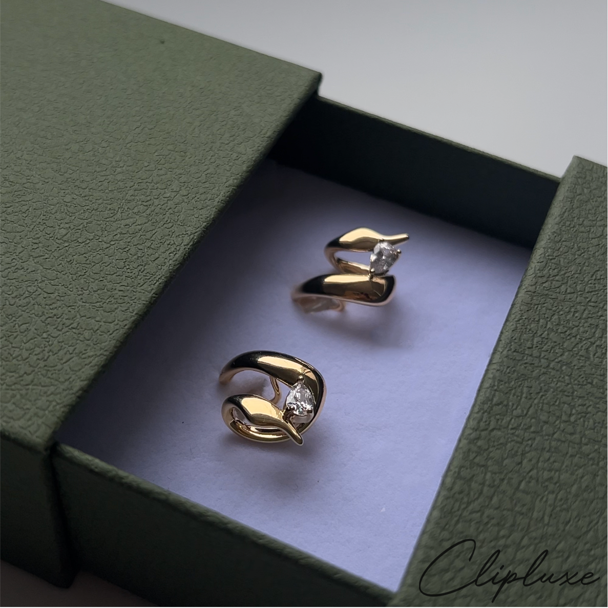 Twisted hoops with gem Clip-on earring