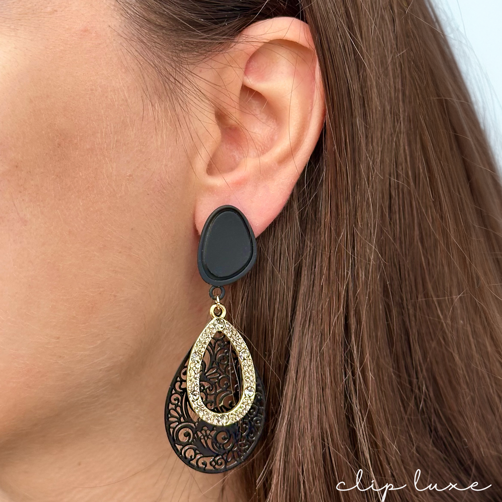 Sleek matte gold drop clip on earrings