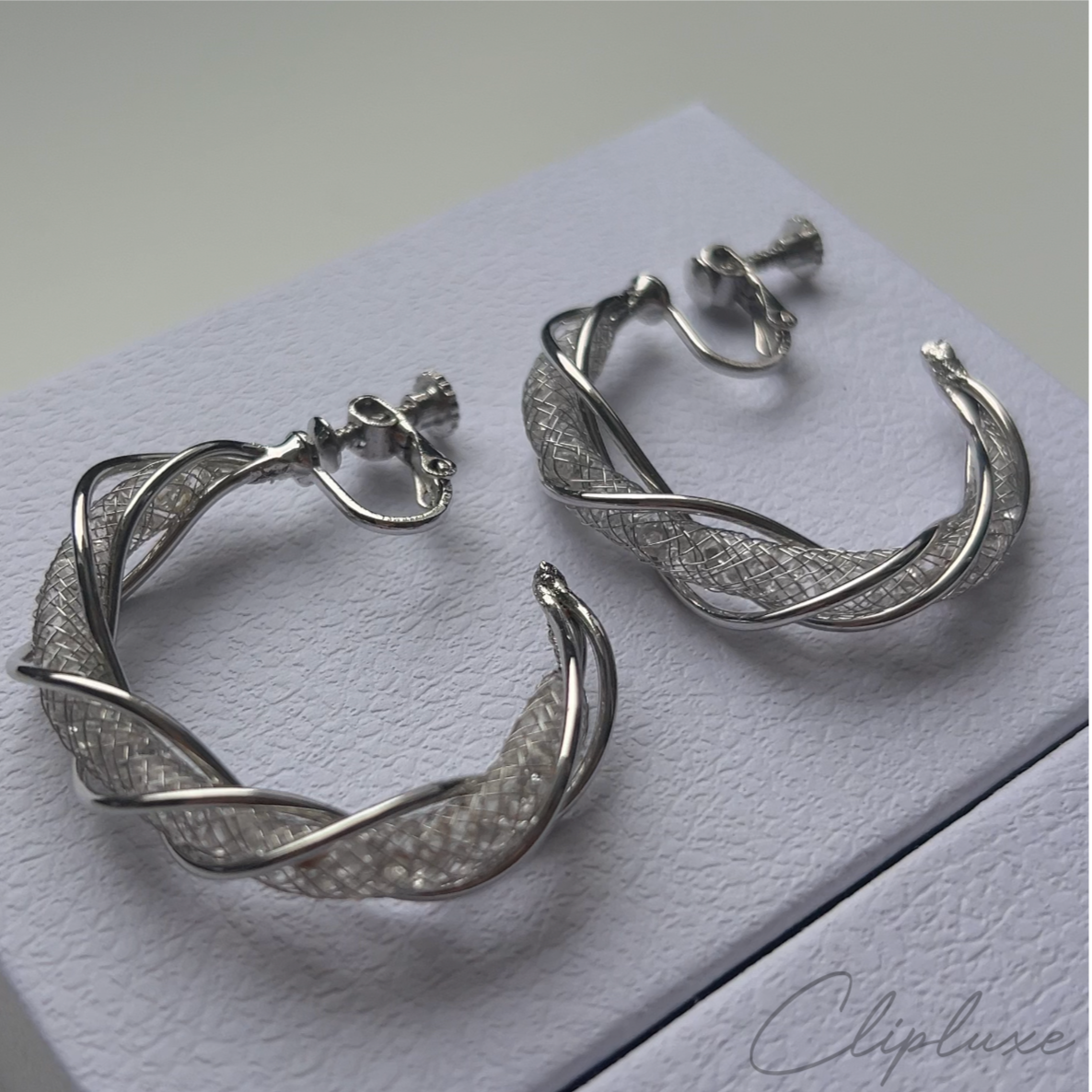 Twisted glitter hoops Clip-on earring