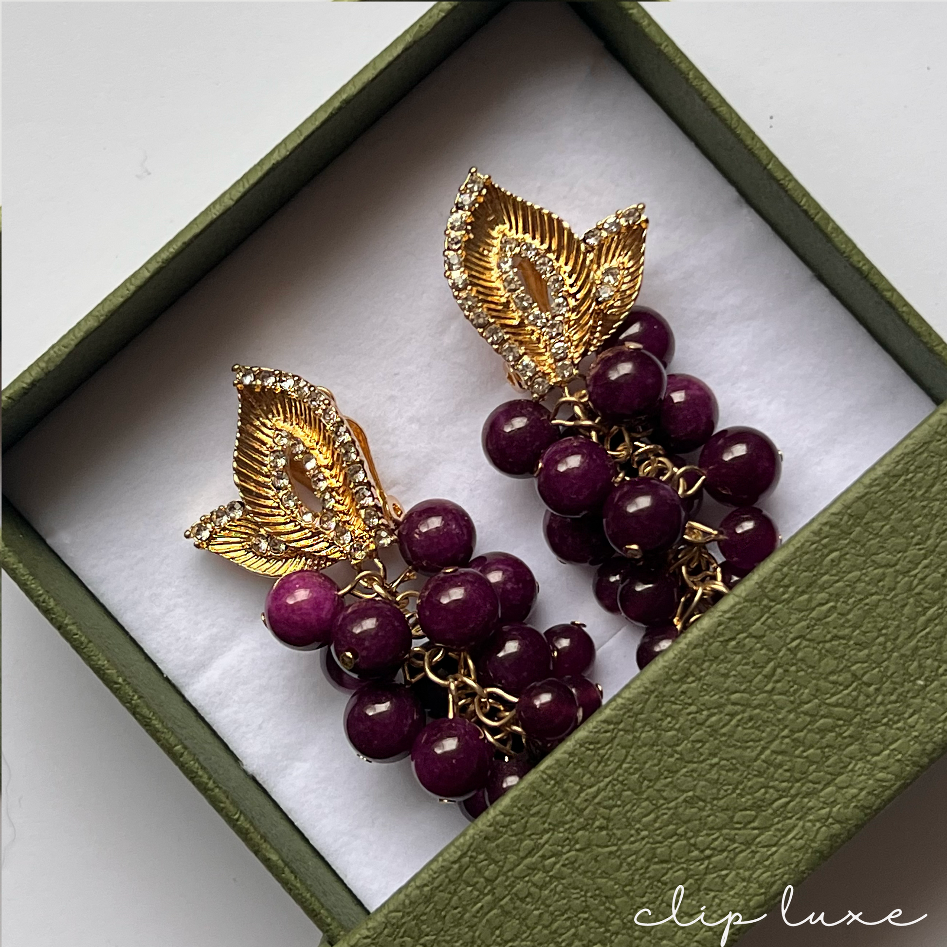 Opulent grape drop clip on earrings