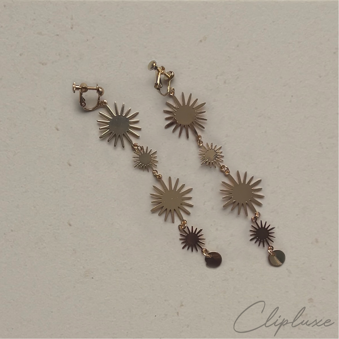 Hanging suns Clip-on earring
