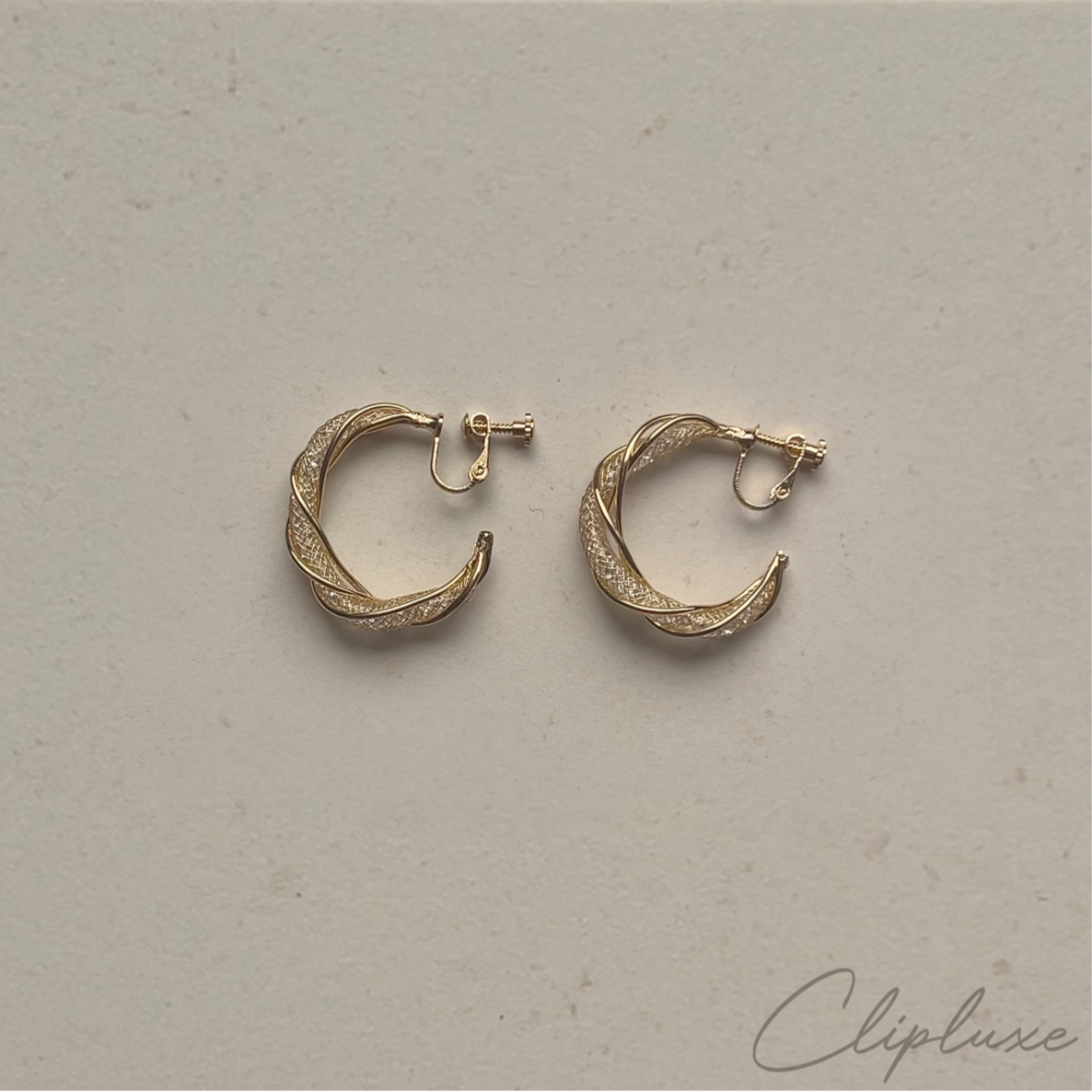 Twisted glitter hoops Clip-on earring