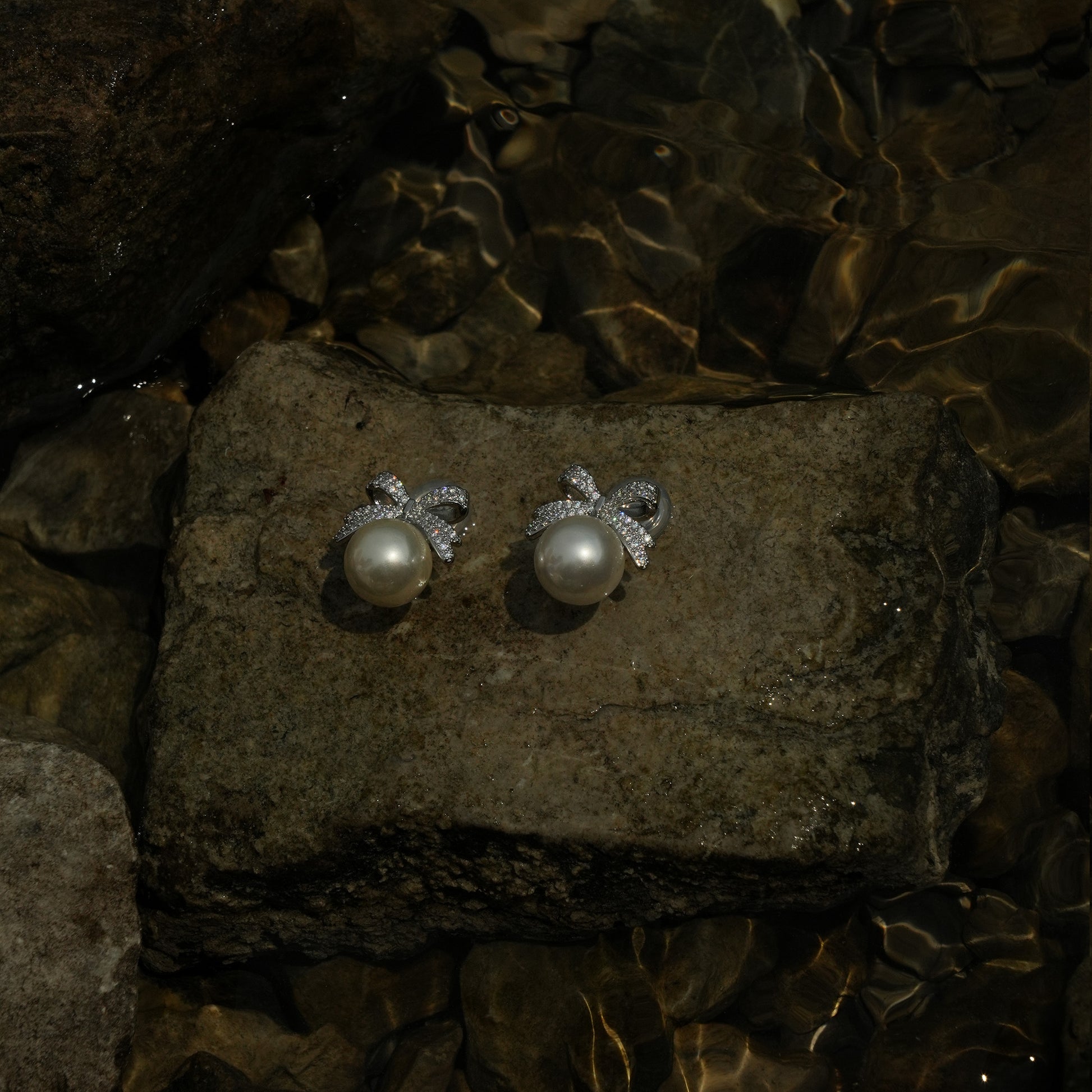 Luxe silver bow pearl clip on earrings