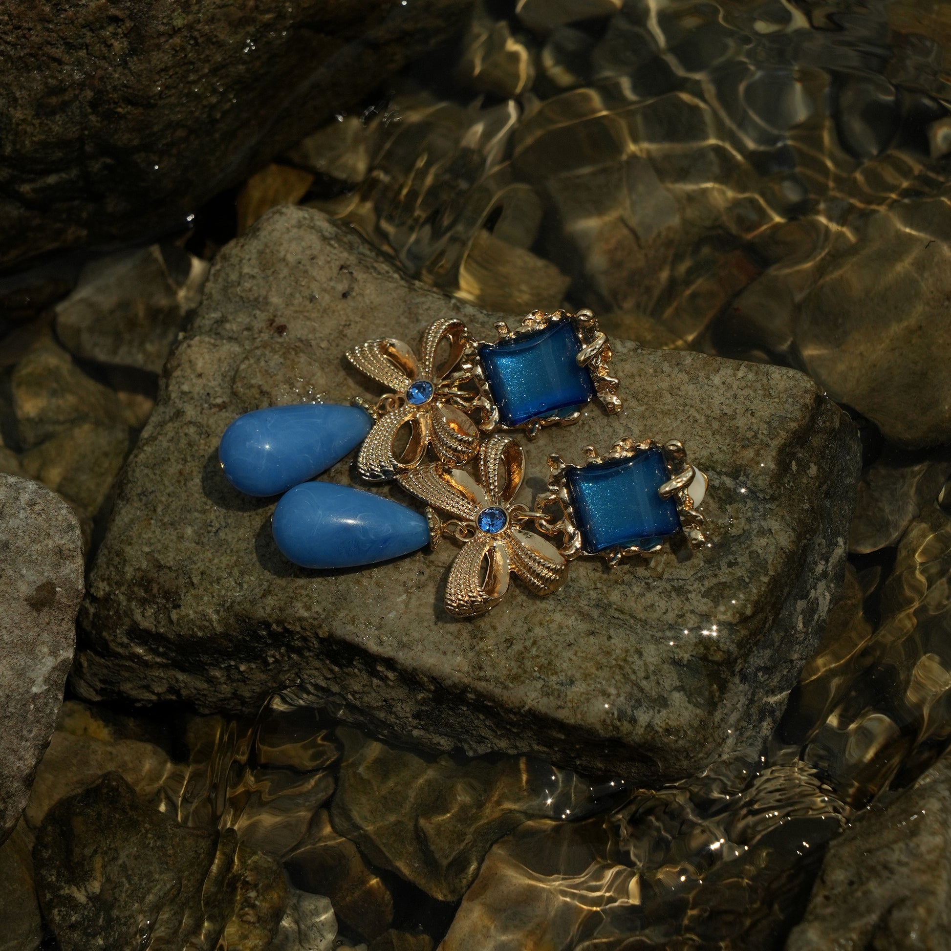 Gold and royal blue dangle clip on earrings