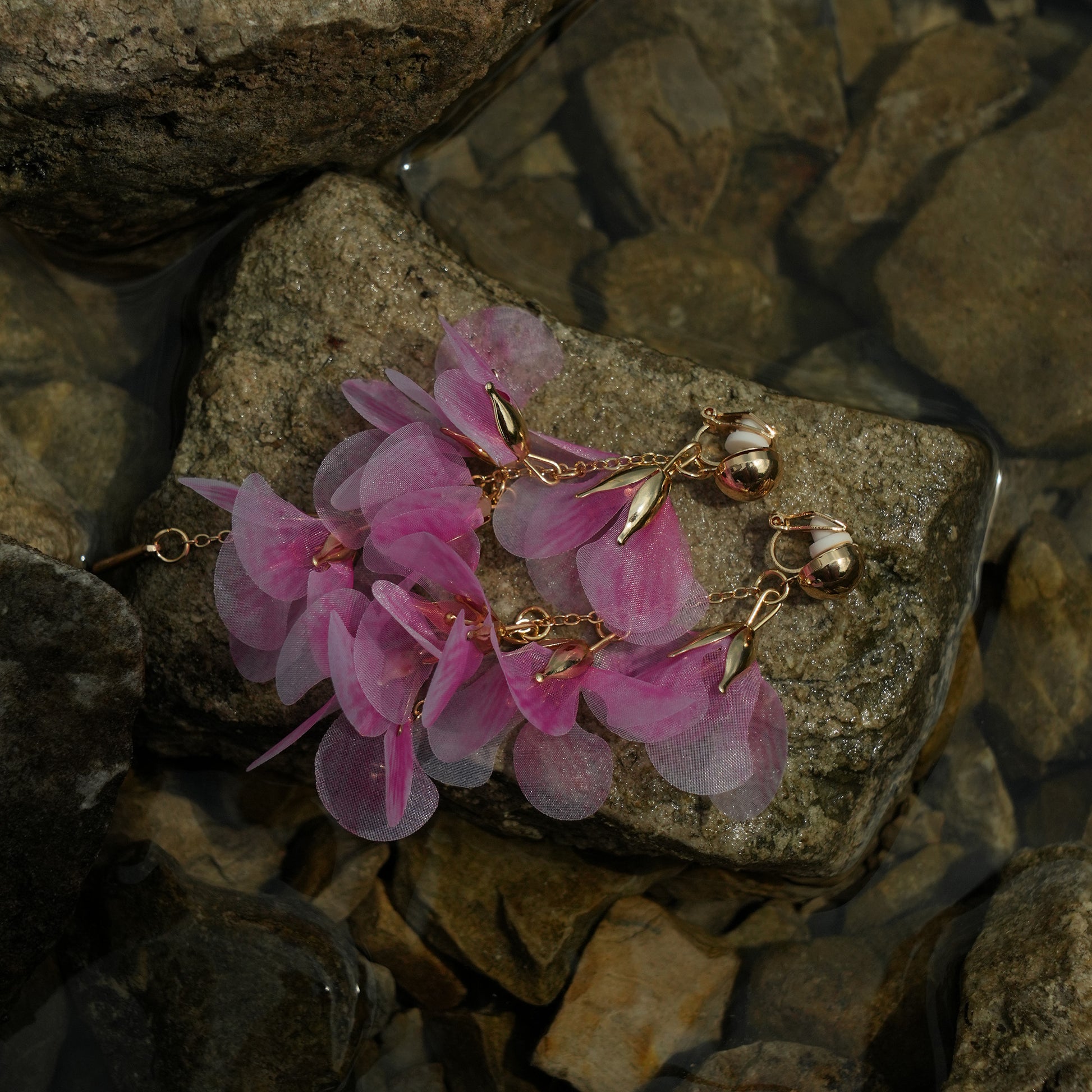 Flowing pink petal gold clip on earrings