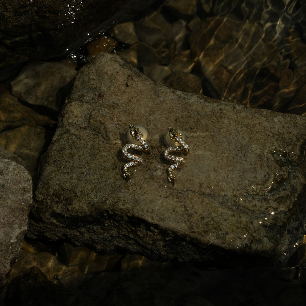 Studded gold dragon clip on earrings
