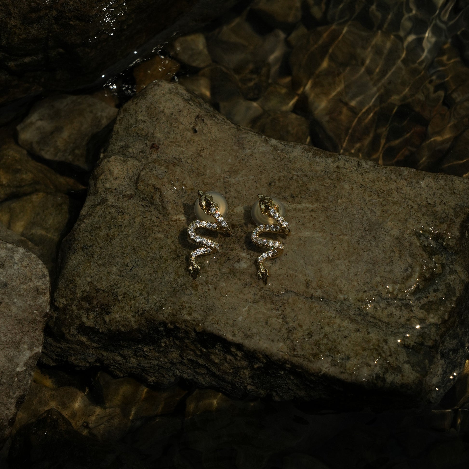 Studded gold dragon clip on earrings