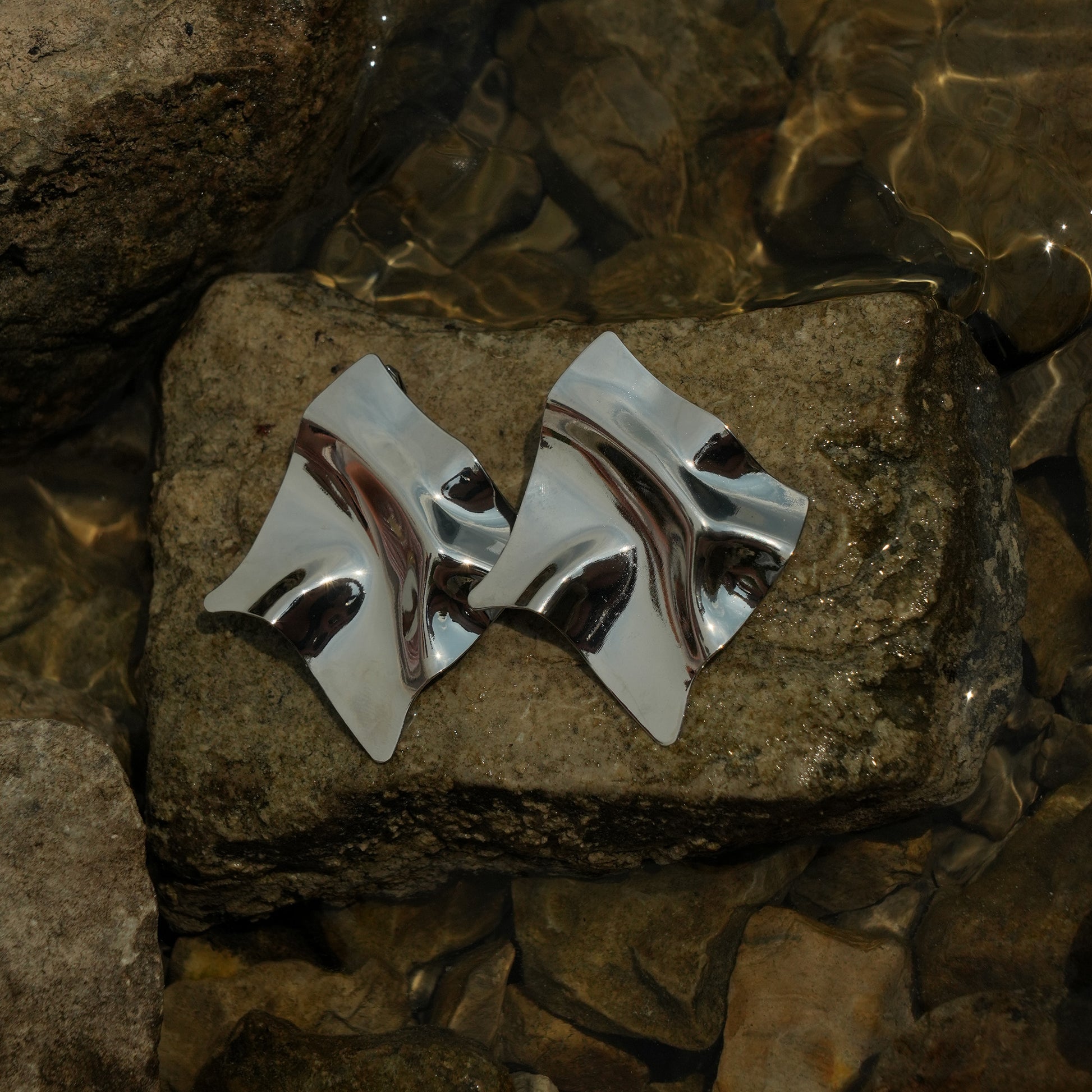 Sculpted square clip on earrings