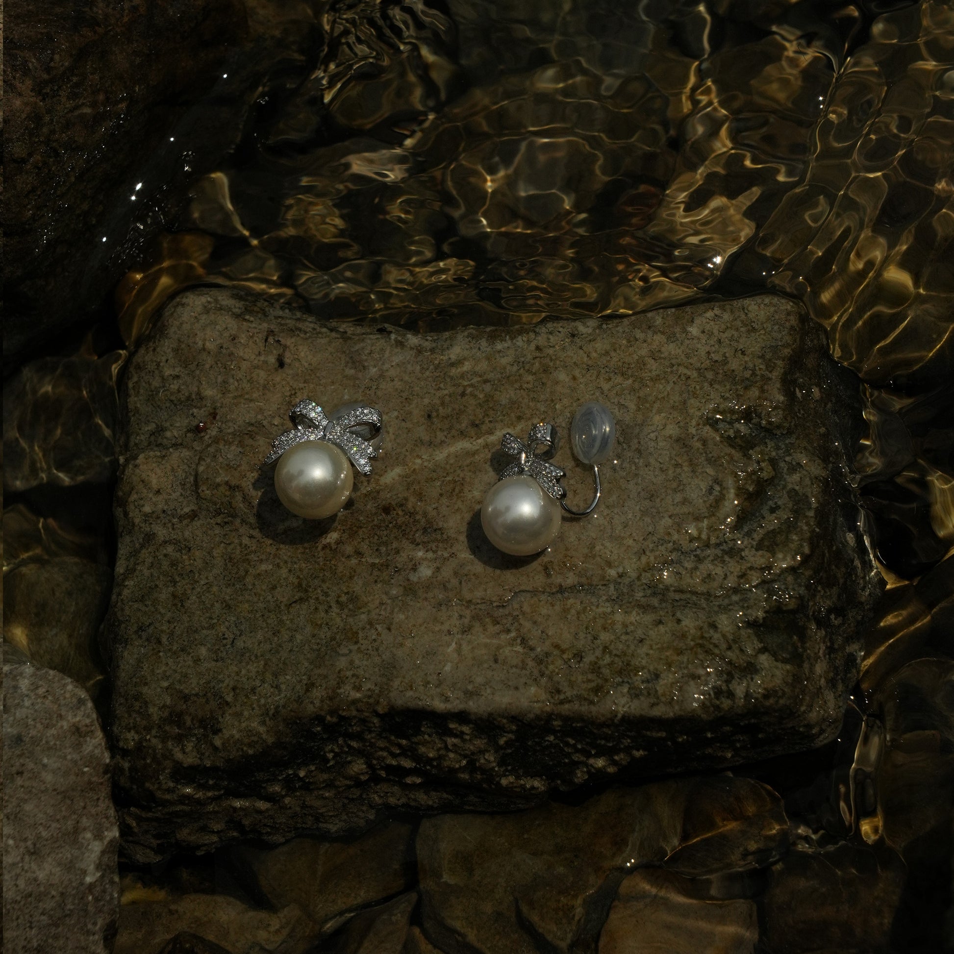 Luxe silver bow pearl clip on earrings