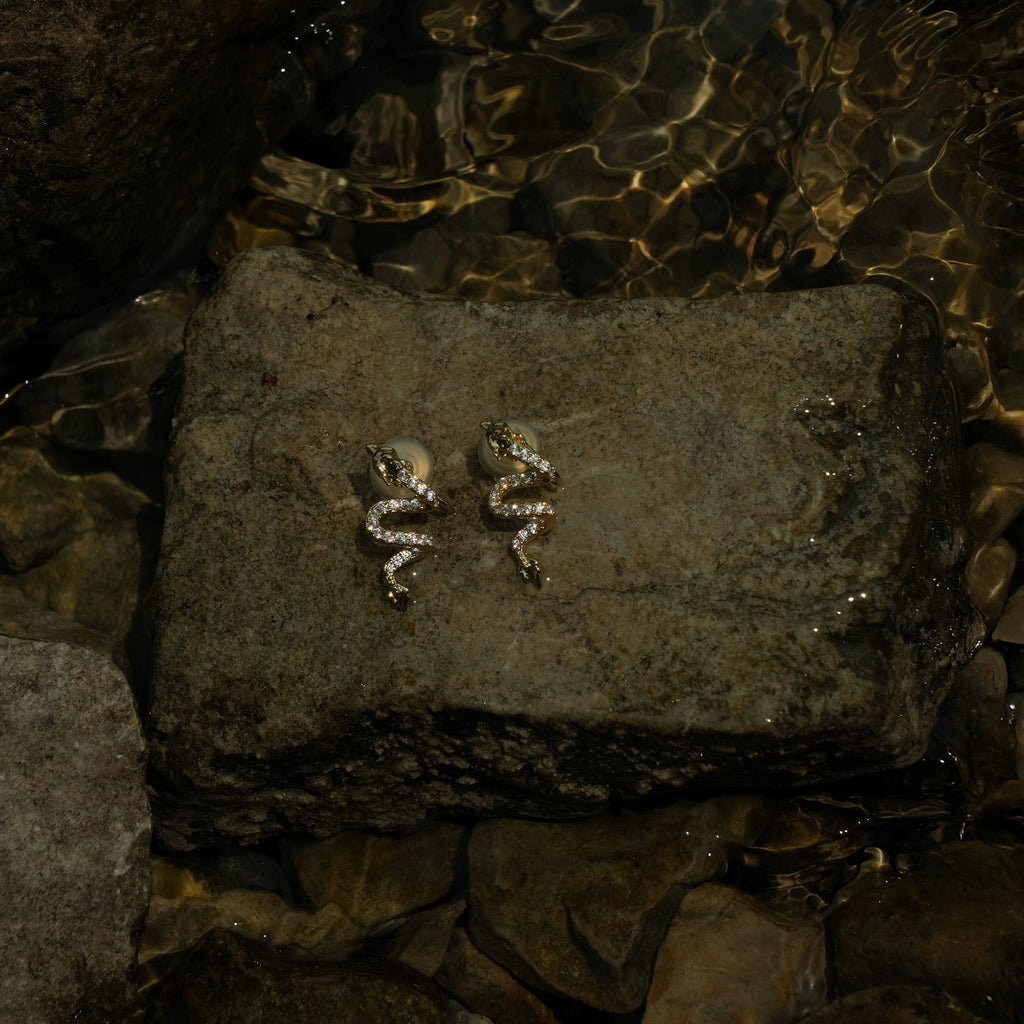 Studded gold dragon clip on earrings