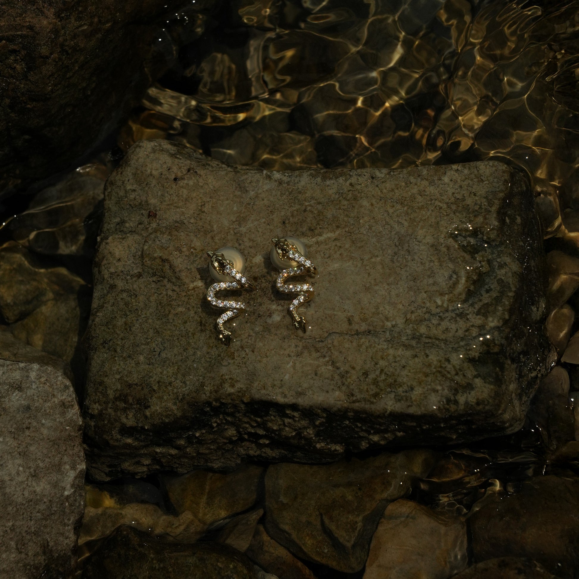 Studded gold dragon clip on earrings