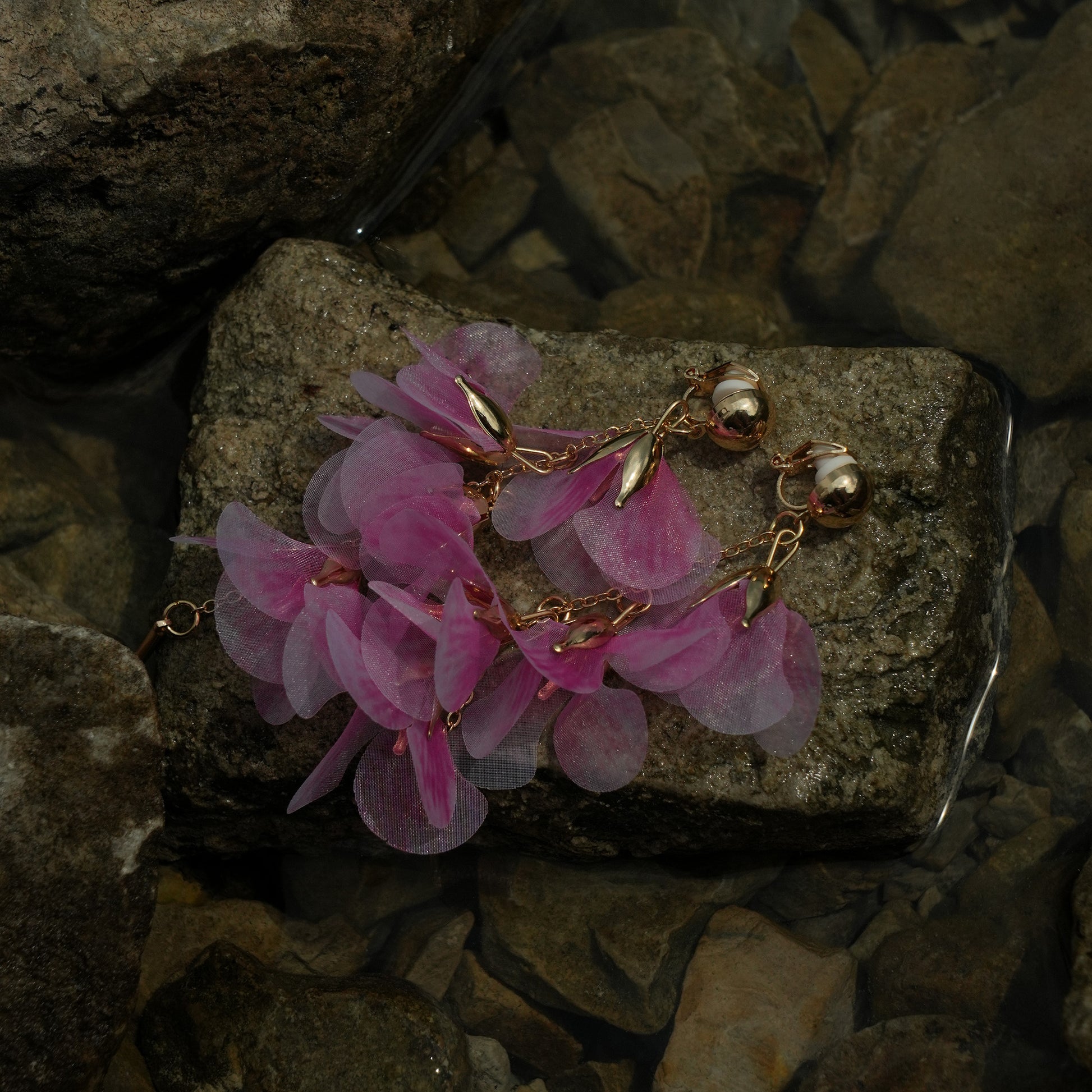 Flowing pink petal gold clip on earrings