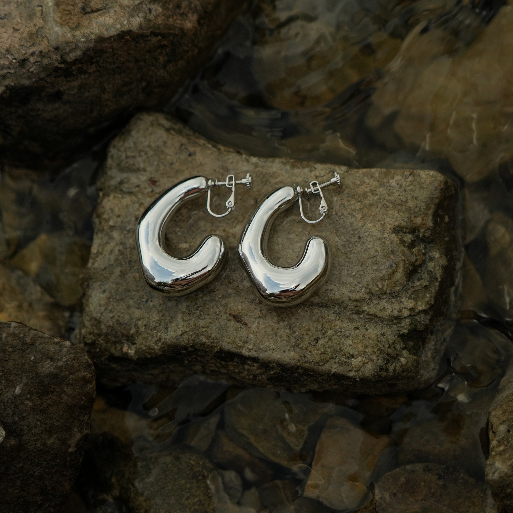 Playful bold drop clip on earrings