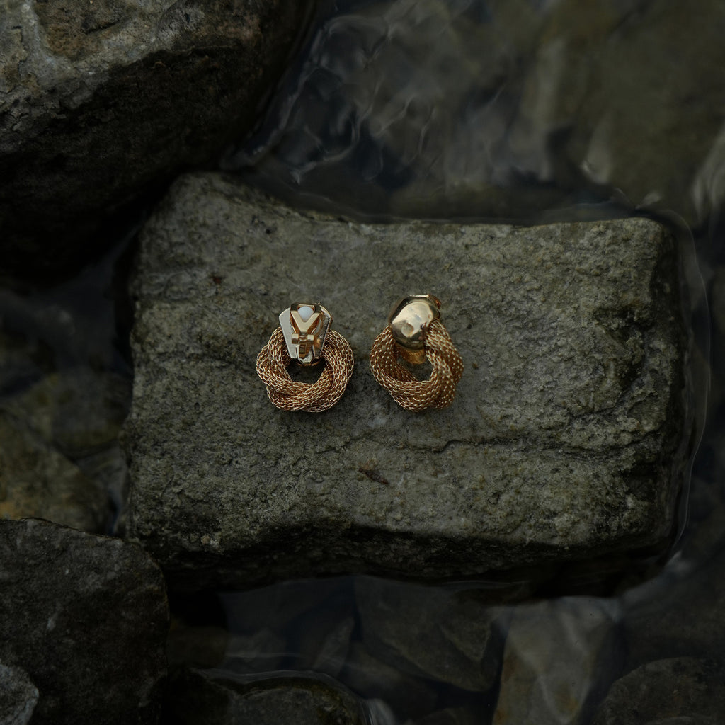 Twisted gold clip on earrings