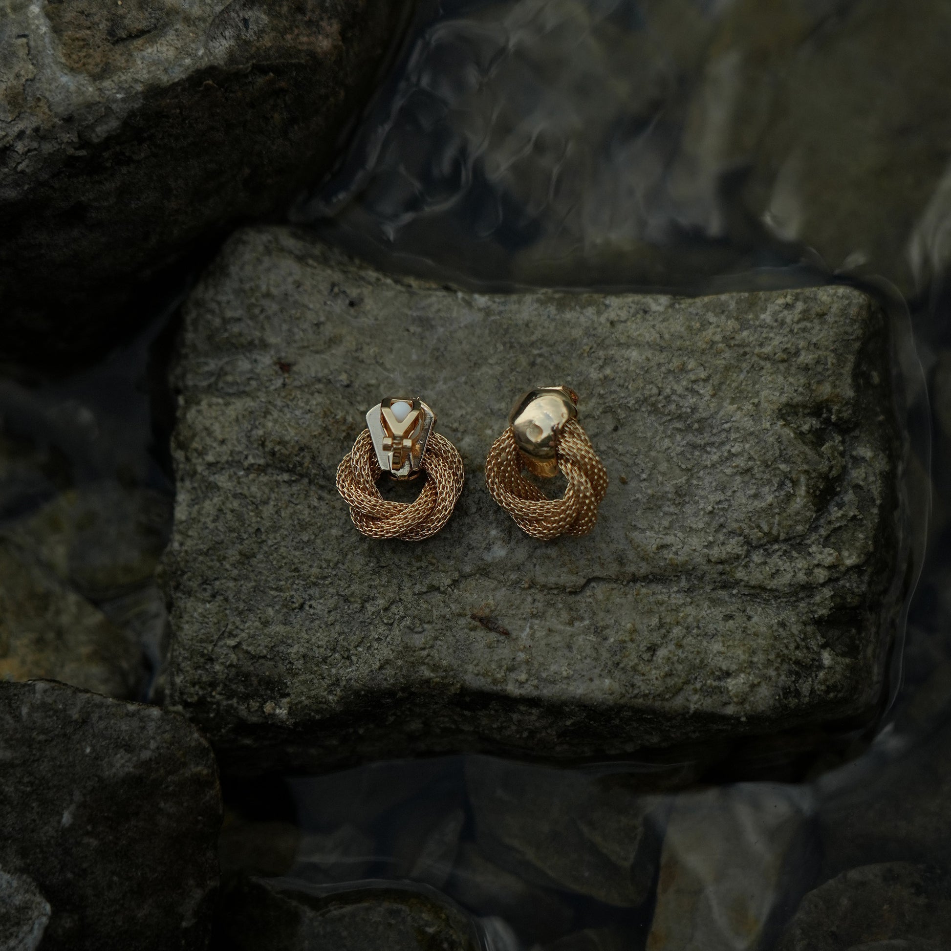 Twisted gold clip on earrings