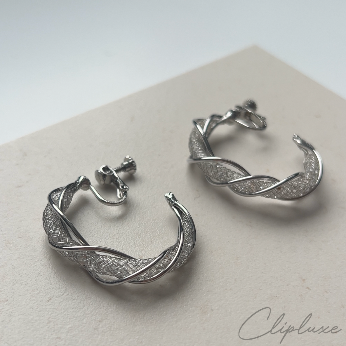 Twisted glitter hoops Clip-on earring
