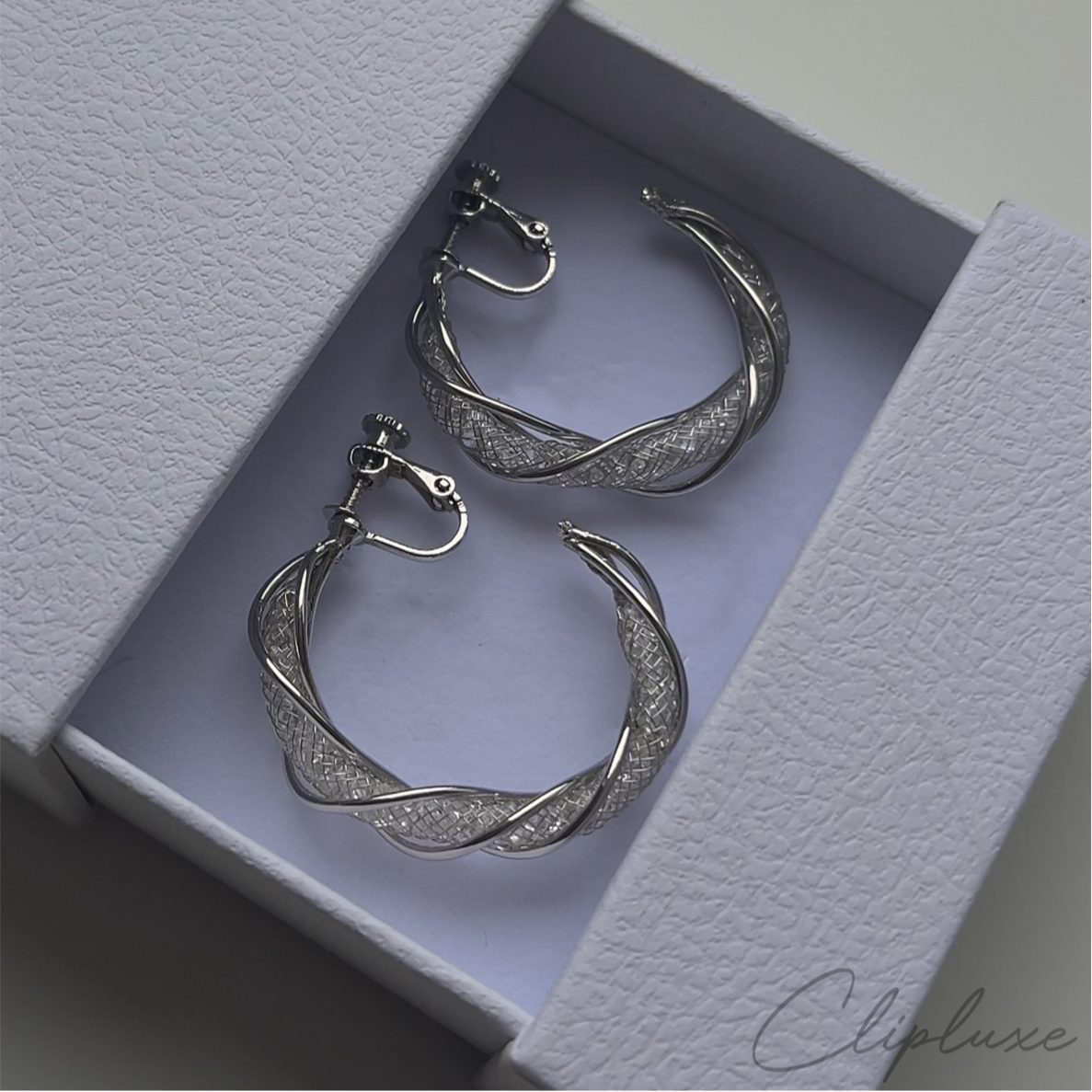 Twisted glitter hoops Clip-on earring