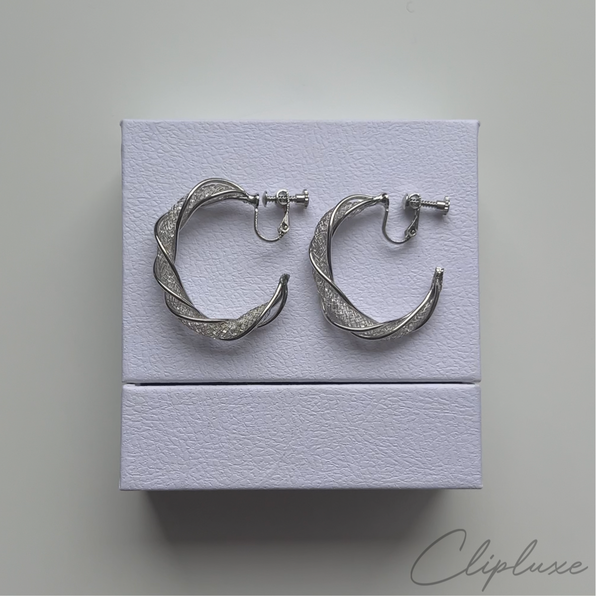 Twisted glitter hoops Clip-on earring